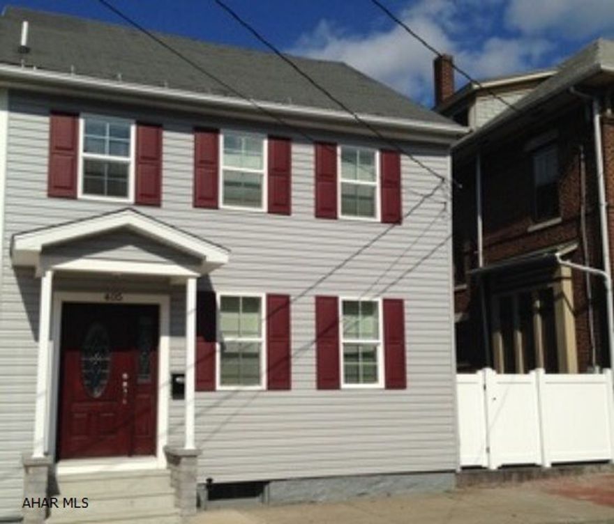 Totally renovated half duplex with all new interior walls, insulation, drywall, oak staircase, flooring and windows. New hot water baseboard heating, new plumbing, electrical, cable and security system. Brand new kitchen with stainless steel appliances. Updated bathrooms. Outside has new siding with a 365 sqft wrap around back porch. Vinyl privacy fencing and solar sidewalk lighting. Property is within walking distance to downtown. Located 1/2 mile from JC Blair Medical Ctr and 1 mile from Juniata College.