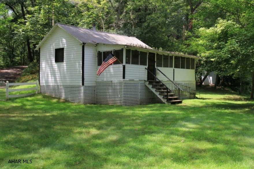 If you are looking for a rustic cabin/ cottage with river frontage look no further.Canoeing , kyacking,fishing ,hunting. Plenty of room to park an additional RV.