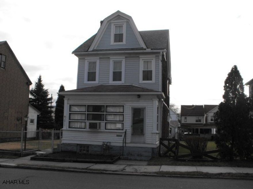 Nice oak kitchen & modern bath. Updated mechanics & newer windows.  Pretty fenced yard.