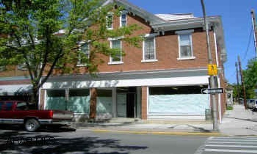 3-Story Brick Building 5-Apartments Plus-Formerly Pete's True Value Hardware, Space could be either retail or Office- Contact Office for more Information- Roof is Flat & Pitched.