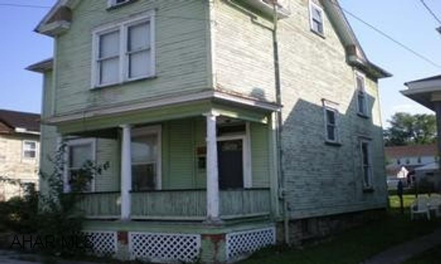 Fixer upper in Williamsburg.Nice 2 car detached garage.  Buyer most pay both transfer taxes.