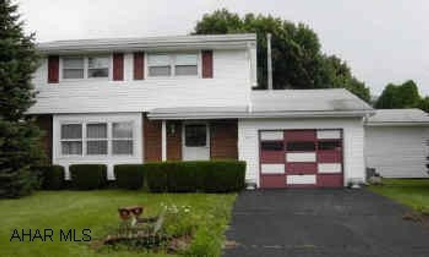 Hardwood floors under carpet except in family room, great area, fenced yard.