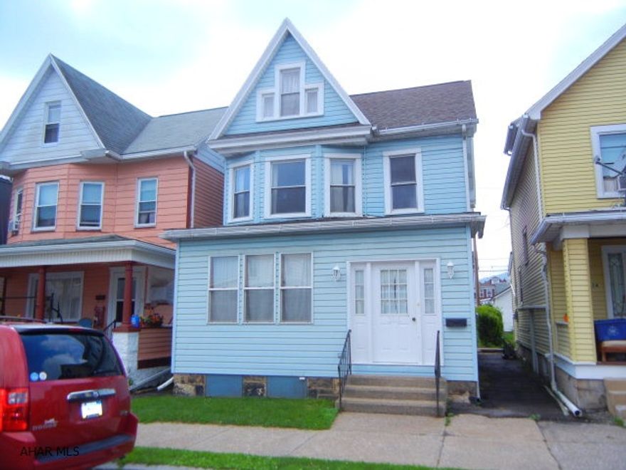 Nice, large 4 bedroom, 2 full bath 2.5 story. Laundry & full bath on 1st floor. Hardwood floors. House has been rewired. Off street parking. Shed. Ready for you!