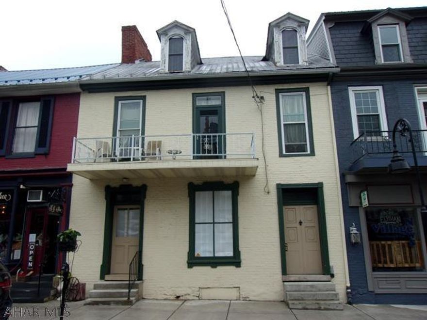 HISTORIC DOWNTOWN BEDFORD COMMERCIAL/RESIDENTIAL PROPERTY.   Circa 1795 home & workshop of renown clock & watchmaker, Jacob Diehl (1776-1858). The currently vacant first floor of this Federal style building was recently renovated and used for specialty retail.  Large, 2 level owner's family apartment includes eat-in kitchen, living room, 2 baths, 3 bedrooms, laundry area as well as 2nd floor balcony overlooking Juliana St.  Apartment could easily be split into 2 smaller units as it was previously.  One unit could be used as a monthy rental  or an airbnb for extra income.  Private residential entrance in front.  Private parking in rear. Convenient to downtown amenities and the Bedford Springs as well as a short distance to I-99 and PA Turnpike. PRIME RETAIL LOCATION