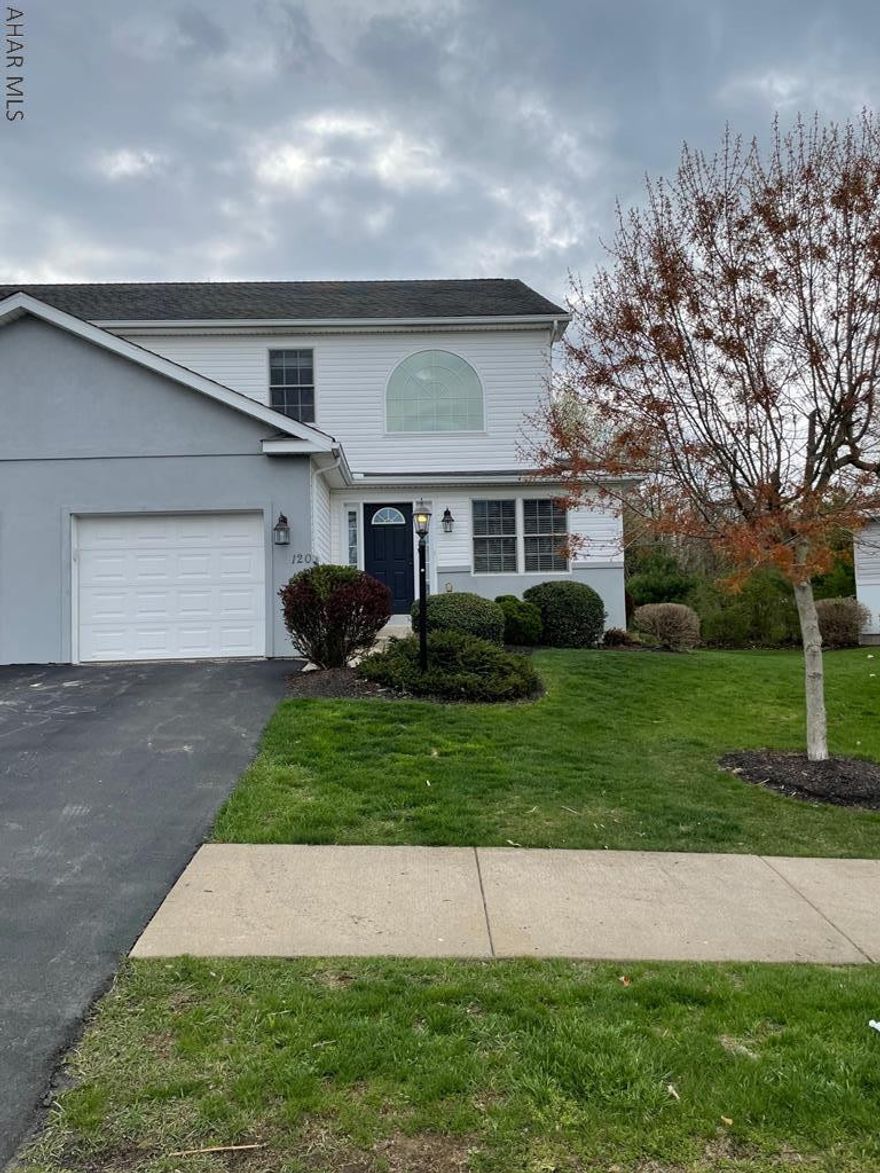 3 bedroom, 2.5 bathroom townhome in Skyview Terrace. Large kitchen with granite counter tops, dining area, and living room featuring a gas fireplace, all with hardwood flooring. Owners' suite on 1st floor. Powder room and laundry conveniently located on 1st floor. 2nd floor has loft space with 2 bedrooms and full bath. Unfinished basement with lots of possibilities! Professionally landscaped! Agent is related to sellers.