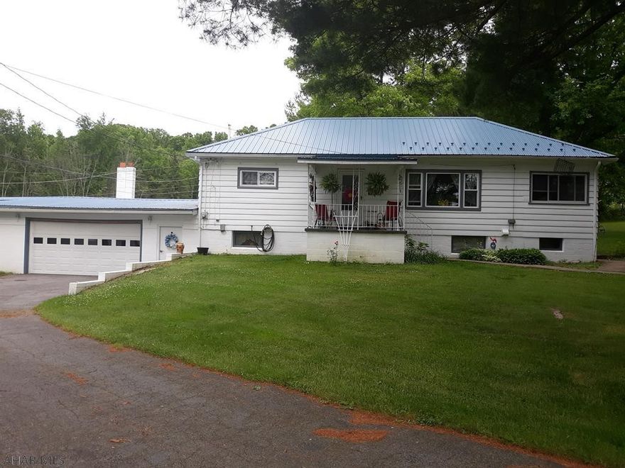 Private Setting ! This Ranch home in Logan Twp is just what your looking for. Big kitchen with a lot of cabinets and kitchen nook ....dining room and living room with hard wood floors, bedrooms with carpet, attic, sun room. Basement level has laundry, bonus room (could be 3rd bedroom), family room, a lot of storage, 2 car attached garage and 2 car detached, this all sits on 2 acres and nicely landscaped. Call for your showing today! Listed for $162,000