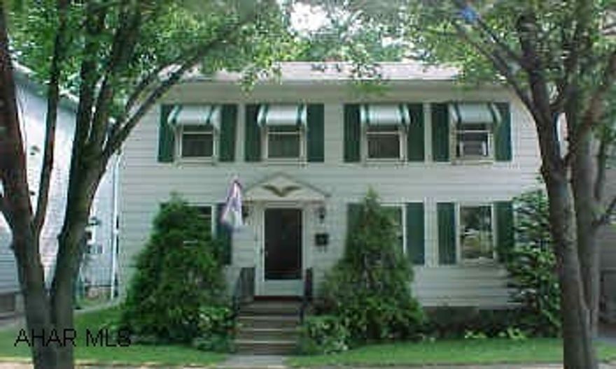 Very nice 3 BR home. 1st floor bedroom, new kitchen cabinets, countertops, sink & faucet July 2003. Screened in back porch. 4 off street parking spaces in alley. Roof 5 years old.