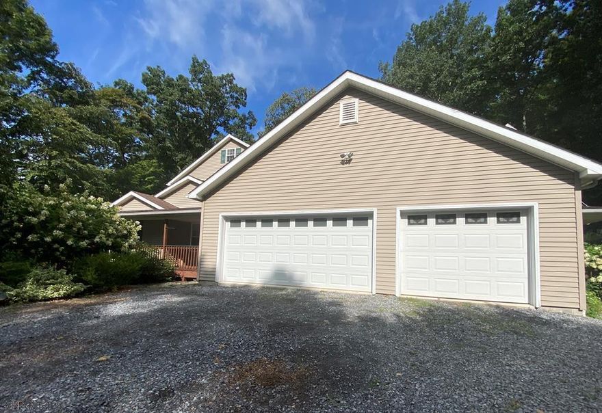 Imagine a mutigenerational home set in a wonderful upscale neighborhood. Add a charming historical town nestled in the woods of the Alleghany Mountainside where the sounds and scents of a forest beckon at your doorstep.  This is the house for all to enjoy! A welcoming large covered porch surrounded by natural beauty leads to the separate 3 bedroom wing where two master suites enjoy walk in closets and private bathrooms. Another separate 3 bedroom wing with two master suites, walk in closets and plenty of windows take in nature at your doorstep. A separate entrance leads to a perfectly placed main floor home office or one bedroom wing. All units come with their own living room, kitchen and laundry rooms.  Yes, multigenerational living can be easy in this wonderful setting.