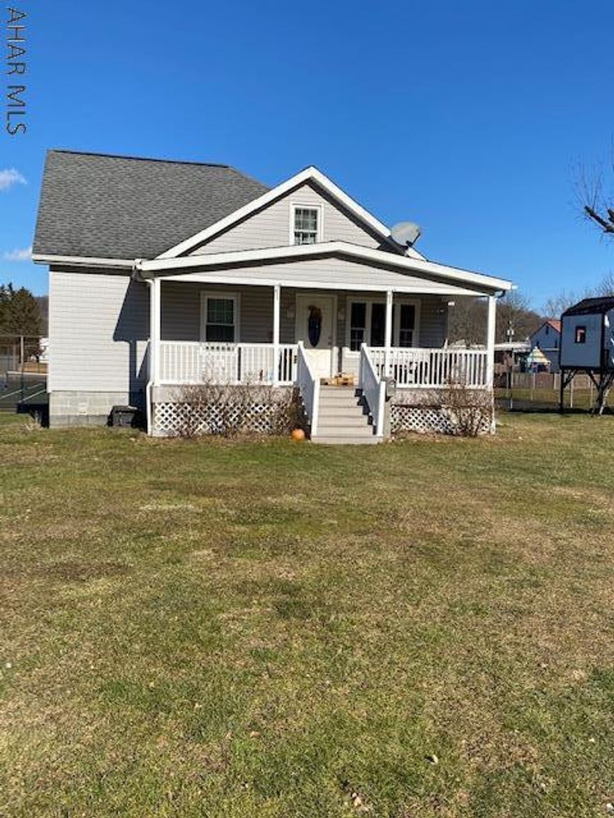 Charming cape cod within walking distance to Downtown Bedford. Quaint home has vinyl front porch and numerous updates. Beautiful knotty pine walls, floors and ceilings throughout home add to the country charm. Kitchen has hardwood floor, oak cabinets and granite countertop. Two bedrooms and one full bath w/ extra wide tub on the first floor. Both 1st level bedrooms have walk in closets. Master bedroom located in the loft area. Walk through his and her closets to master bath that include tile floor and large jacuzzi tub. Lots of enclosed storage located in the loft area w/ lights. Heated basement w/ food pantry area, laundry area and wood stove. Detached, two car garage is 24x32 w/ radiant floor heat, electric, and water and sewer hook ups. Gravel drive, mature landscape. A must see home!