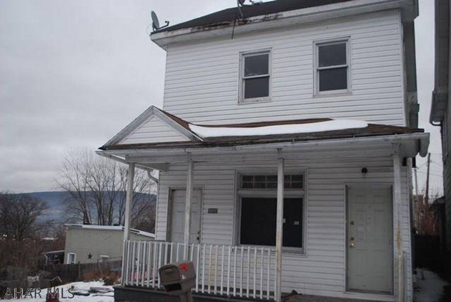 Investment opportunity!  Money making potential!  Fixer upper duplex with solid bones!