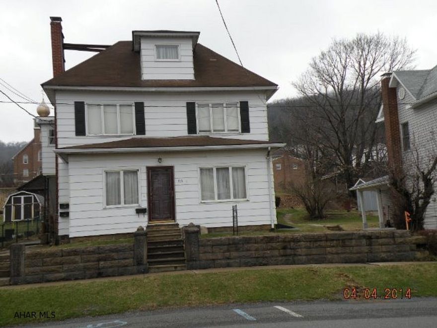 Attractive, well maintained 2 1/2 story home w/ 2 bedroom,1 bath on main level 2 BRs 1 bath on 2nd level, solid cherry kitchen, family room with a beautiful wood burning fireplace. Sun porch & laundry on the 1st floor. Also includes 2 car detached garage. 2- 1 BR apts. Motivated Seller