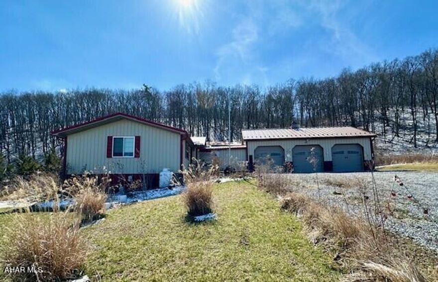 This charming bungalow is the perfect fit whether you're looking for a full-time residence, seasonal home or a relaxing weekend getaway. Featuring 2 comfortable bedrooms, a loft for storage or sleeping, and 1 full bath, the home offers a warm and inviting open-concept layout that seamlessly blends the living room, kitchen, and dining area, ideal for both everyday living and entertaining.  

Enjoy the convenience of inside access to a generous 20x24, 3-car garage with electric, providing ample space for vehicles, storage, or recreational gear featuring a nice workshop.

Outdoor enthusiasts will love the prime location, with Pennsylvania State Game Lands   #48, and just minutes away for hunting, hiking, and exploring nature, and a mile from  Shawnee State Park nearby offering year-round recreation including boating, fishing, swimming, and scenic trails.

Whether you're unwinding on weekends or settling in year-round, this bungalow offers comfort, convenience, and easy access to the great outdoors. Seller is selling AS IS WHERE IS.