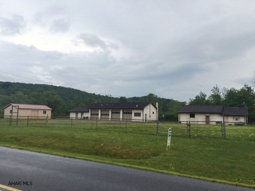 Great property for sale. Zoned manufacturing/farming as stated by Frankstown office. Has 3 buildings and 3.68 acres. Plenty of room for whatever you want to do or expand your business. Come see what this property has to offer. Could be kennel, garage, rental space, manufacturing, storage unit rental. Use your imagination to make this whatever you want.