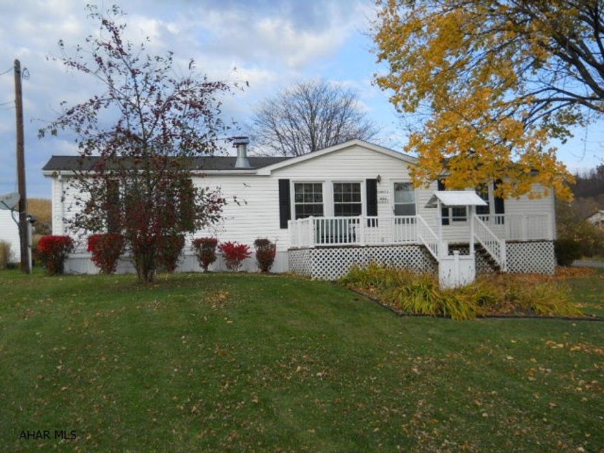 Very well maintained manufactured home on a large lot in the Borough of Newry.  2 car detached garage.  Master Bedroom suite.  Large living room and Kitchen.  Propane forced hot air furnace with central air.  Owner has updated windows to thermal pane insulated windows.