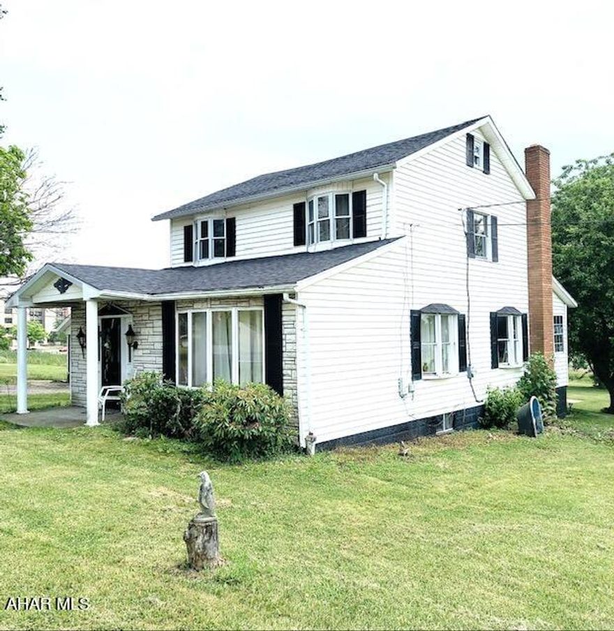 Plenty of potential with this 4 bedroom, 1 bath, 2 story home on almost 2 flat acres in a serene country setting that is just minutes from downtown Ebensburg. Property features hardwood floors throughout the home.  Home features 2 garages, as well as an older barn.  There are many possibilities and uses for this property! This home is just waiting for your imagination and finishing touches! Call today to see this property before it's gone! Recent survey completed, new kitchen counter tops, new kitchen ceiling and floor. Bathroom has new flooring ,ceiling and lighting along with a new vanity. New ceiling fans in all rooms. Residence features a new roof. Owner is licensed Real Estate broker