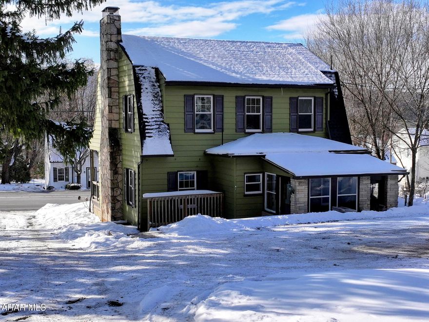 Looking for a cozy cape cod style home, call to take a look at this one.. Owner has repainted the entire interior, including all the woodwork, New carpet up the steps , landing and small bedroom. Replaced rear sunroom door. Replaced and finished all front porch boards, Home is heated with a heat pump and includes central air. Has a lovely stone fireplace in the living room. 3 bedrooms, and a full bath upstairs, first floor has kitchen, dining room ,living room , 1/2 bath and a sunroom. Basement is partially finished , perfect for a family room , office or game room. Has a utility room with laundry and storage area. Parking in back. Come take a look!