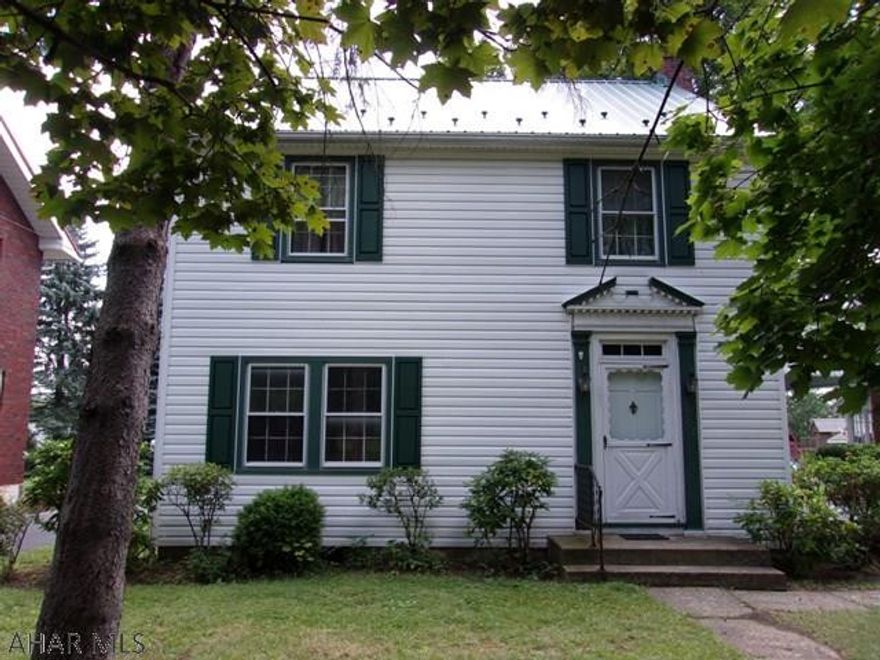 Located on a quiet cul-de-sac street in Wehnwood,  2 blocks from PSU.  1st floor features a living room with fireplace plus a door leading to covered side porch.   Also features a dining room with curved archways and great natural light and a nice sized kitchen with easy access to a small side porch leading to the backyard.  Second floor contains 3 recently painted bedrooms and a bathroom.  Attic offers plenty of storage.  Hardwood floors are though out the entire home - just needs a little TLC!  New metal roof installed in May 2017 and heating system installed in February 2014.  One car detached garage is also included.  Estimated taxes are $1672.48.  Square footage is estimated - will need verified.