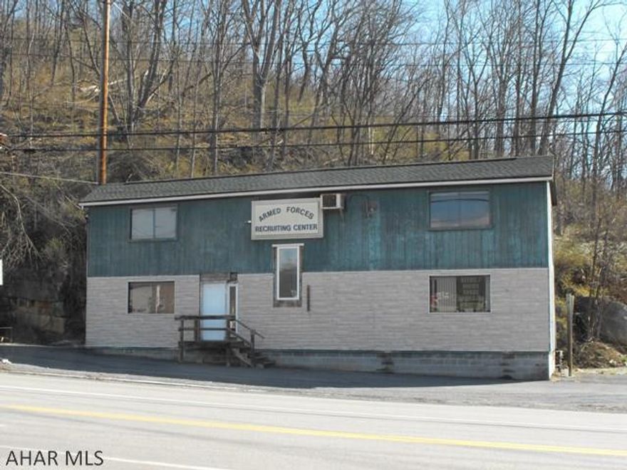 Commercial Office Space/ Retail. Six office spaces, 2 Bath. New Roof in Summer 2016. Located at a busy intersection in borough of Bedford. Close to turnpike, parking