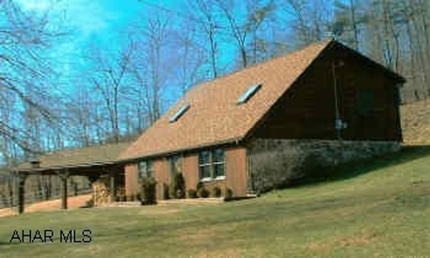 Peaceful secluded farmette on hillside setting with stream, fields, woods and mountain views located near state garm lands. Home with cedar & eldorado stone siding, 12'x16' storage barn, 32'x48' deluxe pole barn with electric & loft. Ready for horses. Oil and gas rights lease.