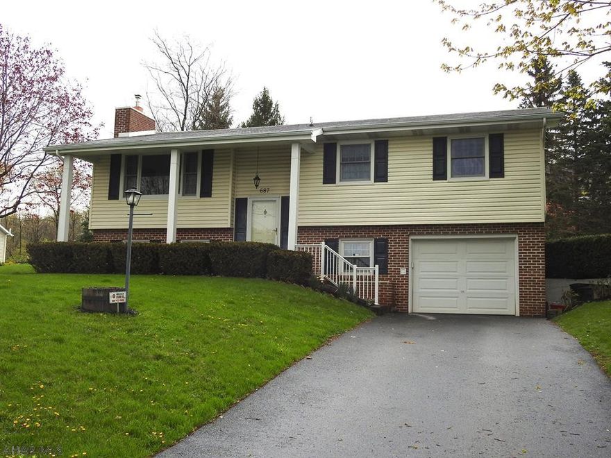 This move-in ready home sits on a quiet cul-de-sac next to Mountainside Park with an amazing view of Beaver Stadium!  Features include updated kitchen with corian counters, new refrigerator and microwave, hardwood floor in dining room with sliders to rear deck.  Great outdoor/entertaining space!  Living room with propane fireplace, nice spacious main bath with double sinks, and 3 bedrooms complete the main level.  Lower level boasts newly remodeled rec room with recessed lighting, mudroom with plenty of storage, and laundry-3/4 bath combo.  Perfect quiet location for you to enjoy the nearby trails and spectacular views.  Don't wait...it won't last long!