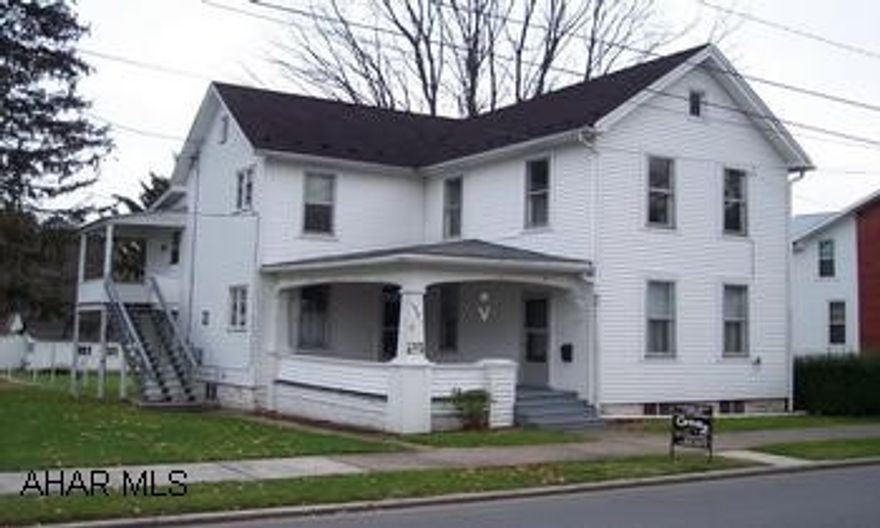 two story duplex  or could be converted back to a single residence.
