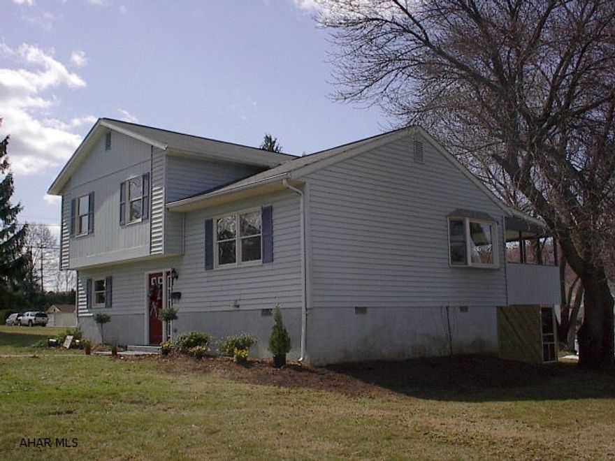 Totally remodeled!  Nice 3 bed 2 bathroom split level on large lot near football field.  New kitchen and baths, large family room, screened porch.