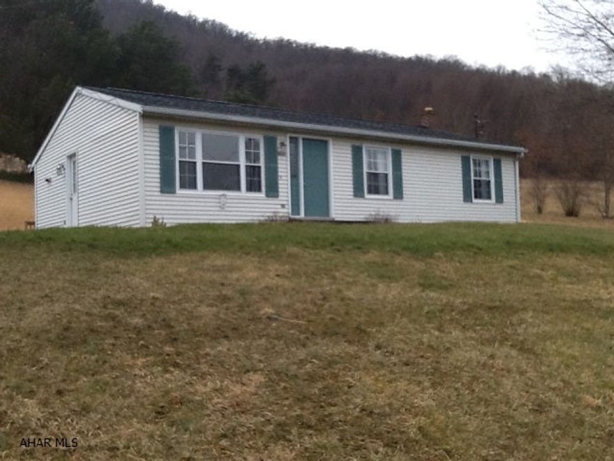 Wonderfully renovated three bedroom ranch with 27 acres. Move in ready and tastefully decorated throughout. New paint, doors, flooring, ceramic tile, carpeting, bathroom and kitchen. The view is spectacular from many rooms. The dining room has sliding glass doors out to nice backyard. Must be seen to be appreciated!