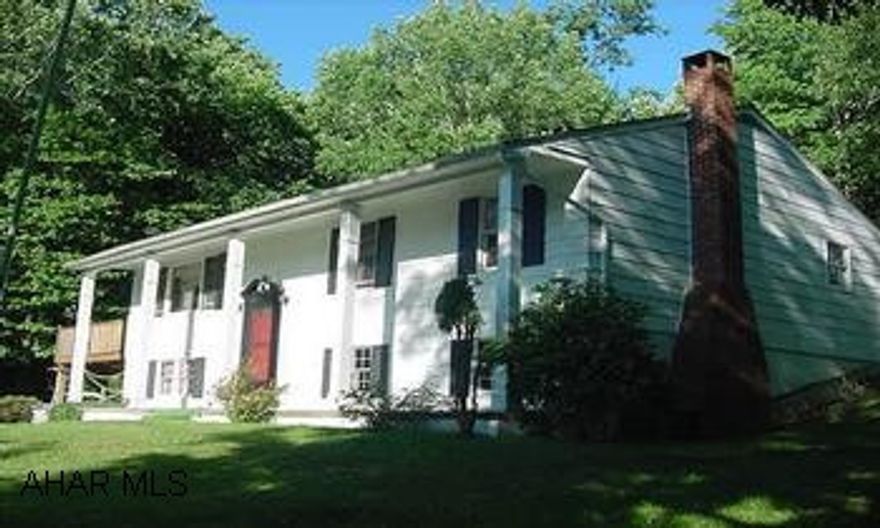 SECLUDED BI-LEVEL ON 9/10 OF AN ACRE IN LOGAN TWP. JUNIATA GAP ELEMENTARY. IF YOU WANT PEACE AND QUIET IN LOGAN TWP. HERE IS A BI-LEVEL ON 9/10 OF AN ACRE THAT IS SECLUDED. JUNIATA GAP ELEMENTARY SCHOOL. 3 BR, 2.25 BATHS, FR W/FP, OHW HEAT, SUNROOM, APPLIANCES. CALL MIKE MANGIA 932-8888.