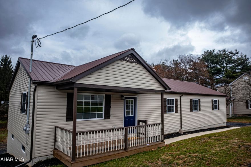 Welcome to this charming one-story home with three bedrooms and two full baths, offering a perfect blend of comfort and convenience. As you step inside, you are greeted by an inviting living space . Step into this attractive eat-in kitchen with granite countertops, tile floor, tile backsplash, and a countertop island for  extra seating.  A pantry and laundry room on the main level for accessibility.  Master bedroom with a  spacious layout and comes complete with two sizeable closets to accommodate all your storage needs. The laminate floors add a touch of elegance to this already stunning space.

 Attached master bathroom, with the  modern fixtures and finishes, the master bathroom has it all, and that's not it! This amazing bedroom also features a back entrance, providing easy access to the outdoors. Whether it's a quick morning jog on the local Rails-to-Trails or a leisurely stroll at sunset, you can step outside and appreciate the surroundings at your own enjoyment. As well as additional two large bedrooms with closets and laminate floors and a full bath with modern fixtures .  The wrap around drive way also adds an extra benefit. Come check out this new home!