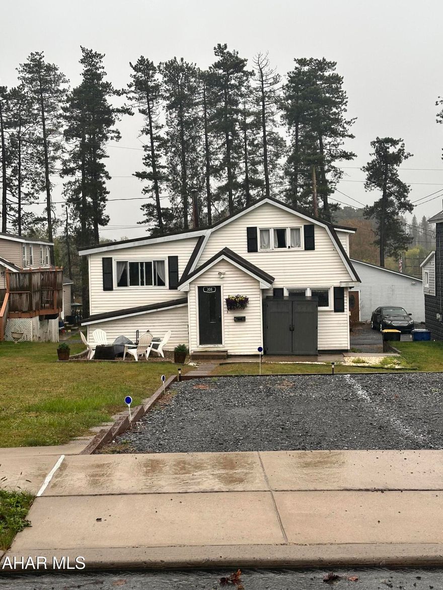 The possibilities are endless for this multilevel home!   This cute home has more space than it looks!  Currently used as an  Air B & B, previously a hair salon, and could be easily converted to a duplex or used as a single family home.