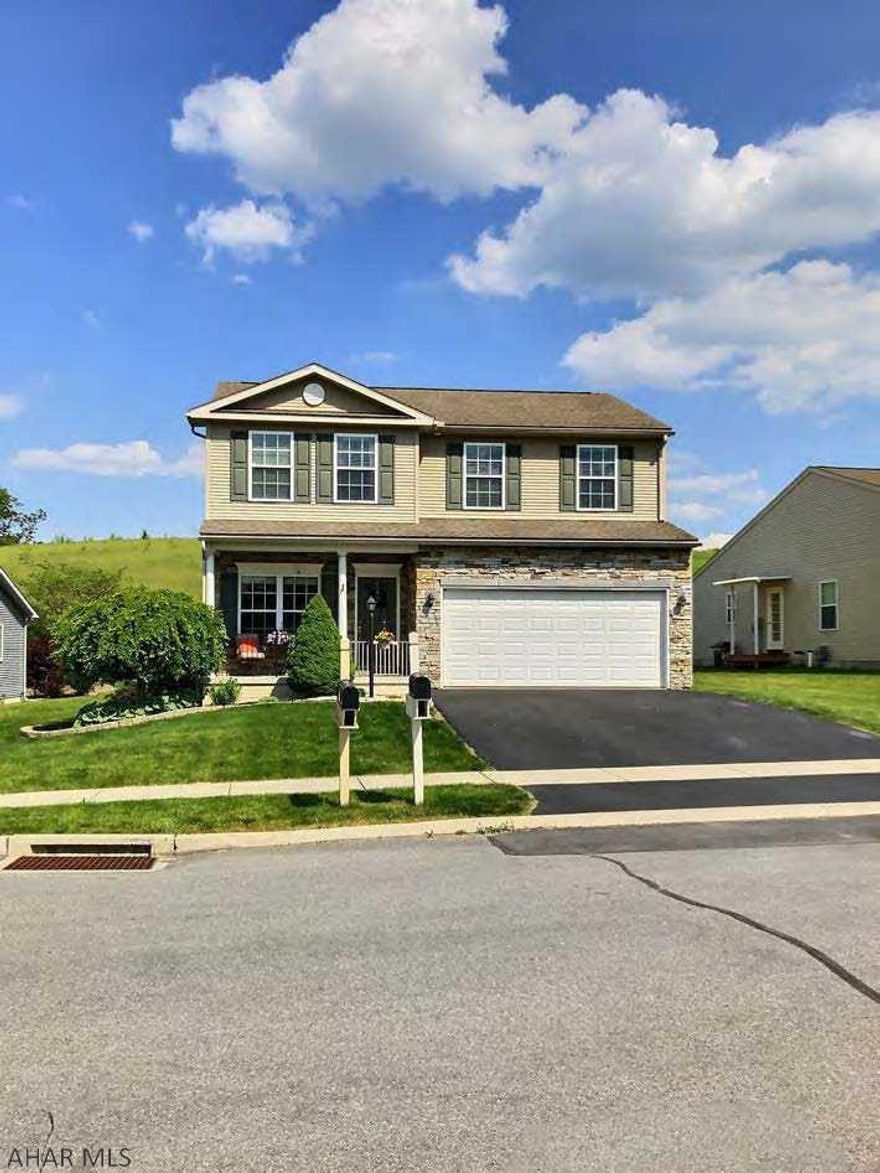 You will love this charming home with spectacular views of the Allegheny mountains. This 2-story home offers an airy living space with open floor plan, plenty of natural light and 9' ceilings. With 3 bedrooms, 2.5 baths, 12x20 shaded deck, 2 car garage and a large basement waiting to be finished, this home provides a generous amount of space to make your own.The first-floor master suite offers a bathroom with ceramic tile flooring, soaking tub, stand-up shower, double vanity sinks and a spacious walk-in closet with pocket door. Kitchen features Corian countertops, ceramic tile flooring,pantry/storage and newer appliances. Front den office or playroom and 1st-floor laundry doubles as a mudroom.  2nd floor has 2 large bedrooms with walk-in closets and connected by a Jack-and Jill.bathroom.