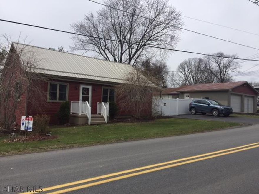 This home is much larger and spacious than it looks!! Situated on q 1/2 acre. Corner lot w/ 2 car detached garage. It is a move in ready home, all it needs is you!! Basement is high/dry, could be finished easily.