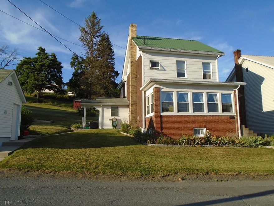 Beautiful 3 bedroom, 1.5 bath on 3 lots. New carpet, Fresh new paint. Nice sun porch, laundry/mud room, pantry, 2 sheds, and lots of storage.