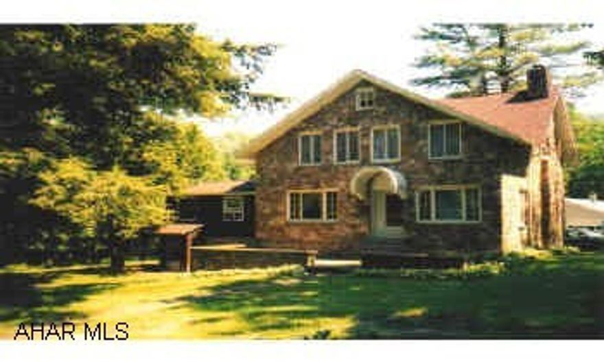 Large stone home on 4.12 acres. Oak kitchen, e car garage, 22x60 workshop. 1st floor 19z17 family room.  Horses Ok, RVPrkg. Large stone home on 4.12 acres. Oak kitchen, e car garage, 22x60 workshop. 1st floor 19z17 family room.