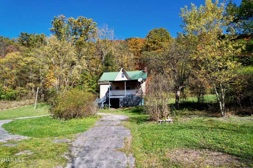 Looking for a fixer upper, this is the property for you.  It is a blank slate waiting to be designed.  Property needs the finishing touches to make it a great home, vacation home or rental property.  Surrounded by beautiful mountain views, close to Raystown branch of Juniata river, and H and BT Trail, Raystown Lake.  Near state game land number 073.  House is being sold as-is.