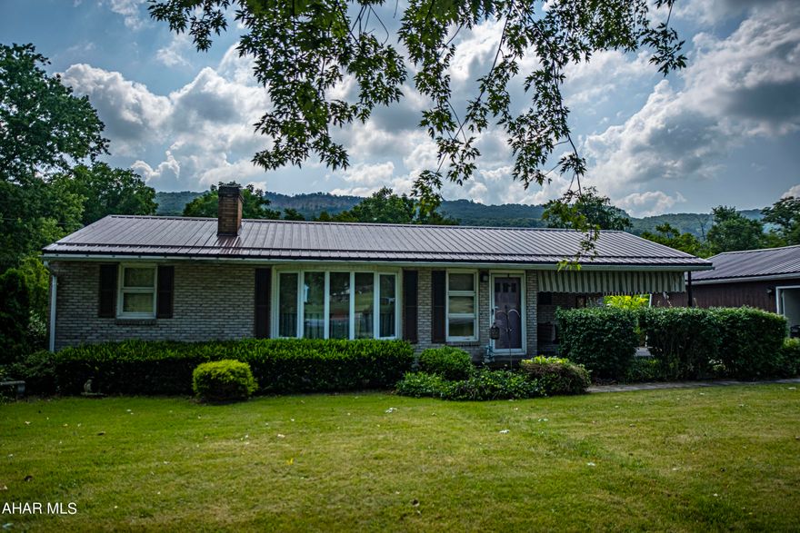 If you're looking for a great home in the Claysburg-Kimmel School District, this may be the one for you! This well maintained, 3 bed, 1 bath, one-story home sits on 2 large lots totaling 0.80 of an acre. It also features a metal roof, a wood burning fireplace, a great front porch and patio, a spacious 2 car garage with additional off-street parking, several outbuildings and a pavilion that provides plenty of space for entertaining. This listing will not last. Schedule your showing today!