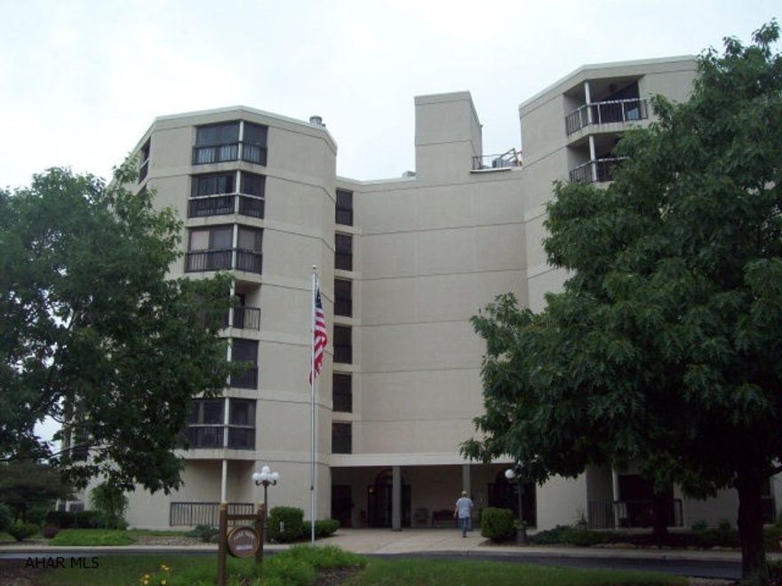 Large 4th floor corner condo with panoramic views.  Master bedroom has a large bath with jacuzzi tub.  Wet bar and mirrored cabinet in living room.  Association fee covers water, sewer and trash.  Underground parking space with storage unit.