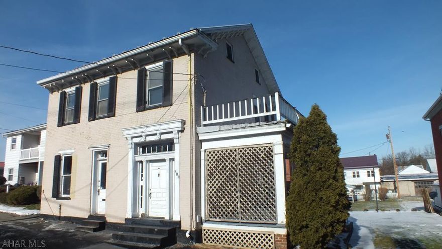 Large brick Williamsburg home with lots of charm and character. Conveniently located in town within walking distance of everything. Large yard and carport. AS-IS sale. Seller will make no repairs.