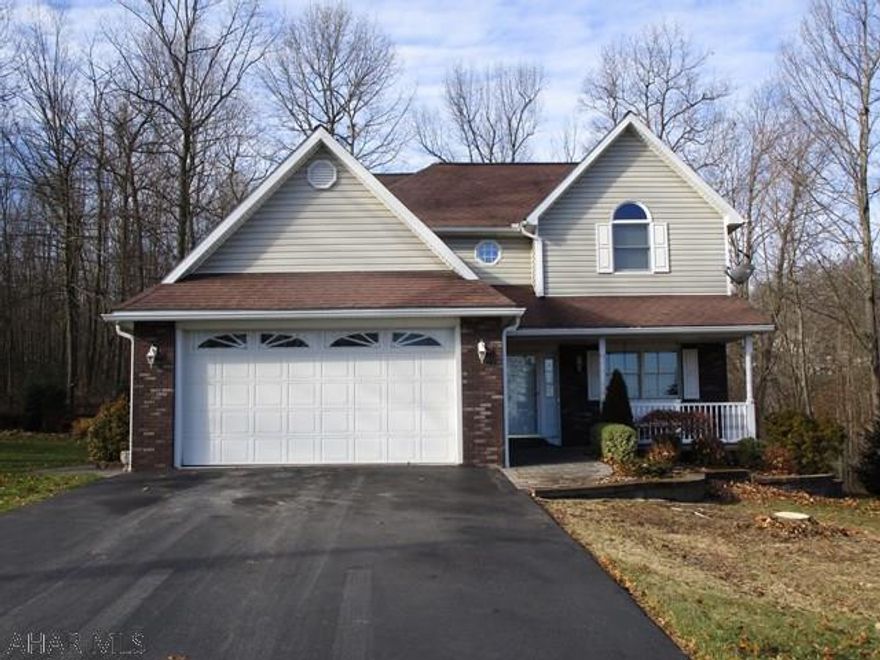 Charming 2-story home located in Ridgewood Heights that has a private deck and Gazebo that invites comfort and a perfect place to relax and unwind at the end of the day. The fireplace in the living room is surrounded by built-ins and the beautiful bay window looks out into the level backyard lined with trees. Lots of natural light shines into the breakfast area through the sliding glass doors located in the spacious kitchen. Hardwood floors can be found throughout the home, a skylight in the bathroom and lots of storage space. Come check out this corner lot home....Don't miss out!