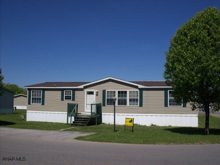 Nice 3 bedroom, 2 bath, doublewide, year 2000, on rented lot in Independence Place.  Lot rent of $368 includes water, sewer and trash.