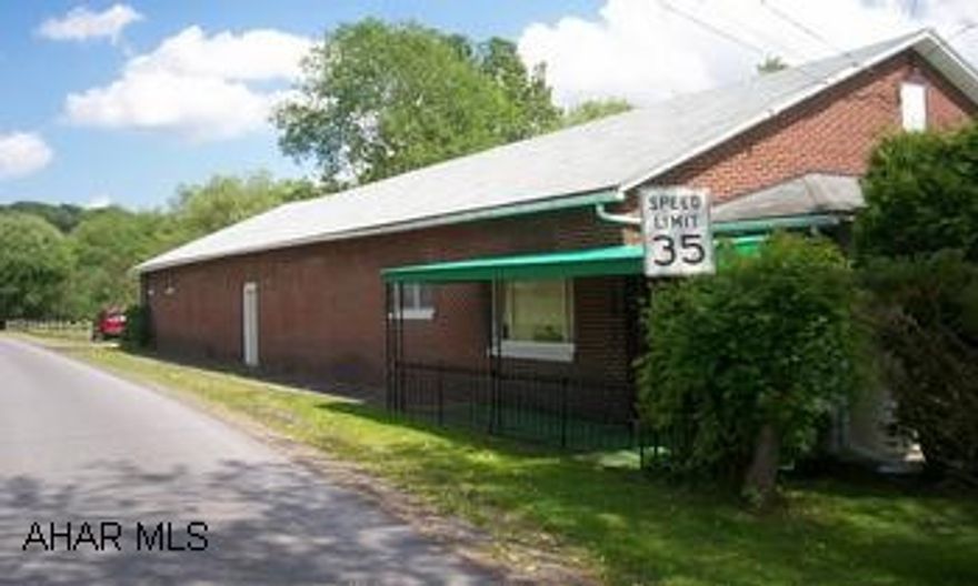 1 story brick home with 2 BR's, Larger attached garagewith 6 car capacity on 0.9 acres Call Gary 948-4132 1 story brick home with 2 BR's, Larger attached garagewith 6 car capacity on 0.9 acres Call Gary 948-4132