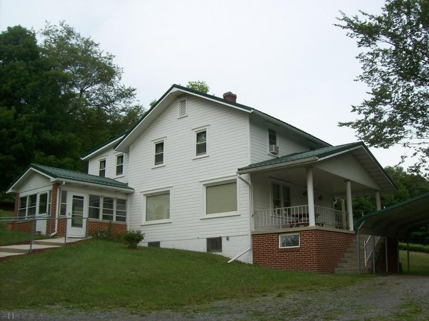 Breathtaking views. Nice rural setting watch the deer and the turkey from the house. Home has huge room, 1.5 baths, newer windows, metal roof, newer furnace. Home has two sunroom one on each side of the house.