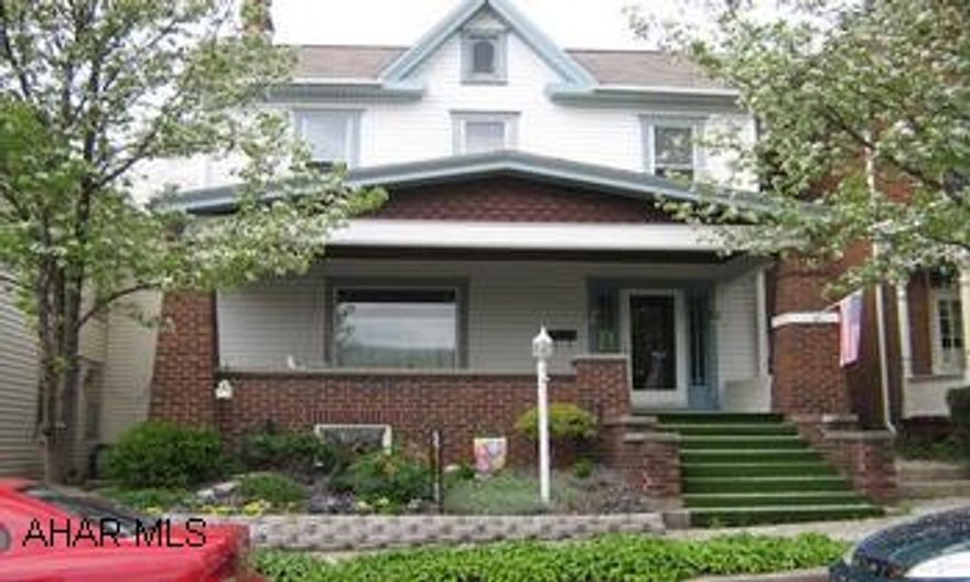 Lovely Hollidaysburg Boro home.... walk to all of your favorite places. Beautiful living room with wood floors and decorative wood burning FP. Large kitchen with newer floor, dining/family area with woodburner. Front and rear staircases to second fl. Nice patio, fenced yard, 3 car gar. Home is bigger than it looks from the street. Better Hurry!