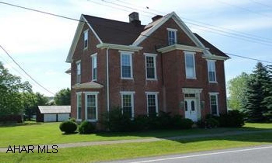 7BR/2BA Traditional brick 3-story home on a level 0.568  acre lot within walking distance to Shawnee State Park and Lake. Home is partially remodeled. Attic could be possible artist studio. Close to town and stores and within walking distance to Shawnee State Park and Lake for recreation.