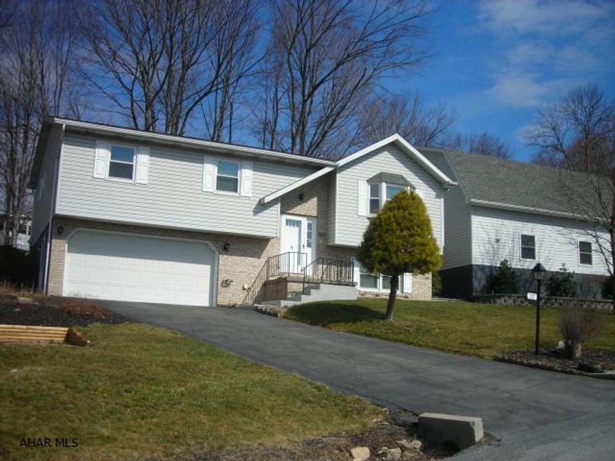 Soooo many amenities and a great location. Split level, 4 car garage stalls, detached garage has a theater room with hardwood floors, wet bar, 1/2 bath above garage. 2 Separate gas furnaces with central air. Immaculate, move in condition, fenced yard, better hurry on this one. Also included in the sale of the home 4 garage door transmitters, 3 ceiling fans, 3 smoke det.