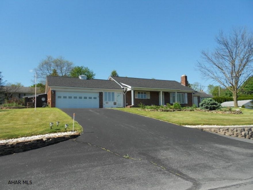 Lovely, custom, designer, unique, excellent condition. All of these words are needed to describe this beautiful 1 level brick home. From the slate floor in the dining room to the custom Buterbaugh kitchen w/ Italian tile floor. Both bathrooms have tile floors and updates. Lg living room and 3 bedrooms all have like-new carpet w/ hardwood floors underneath. Fully finished basement w/ lg family room, bonus room -was used for a sewing room. Laundry room complete w/ washer, dryer and upright freezer. A one-of-a-kind closet storage space, complete w/ cheetah print carpet! The outside is just as inviting w/ a 2 car attached garage, tool shed, 2 car detached garage, workshop and all outbuildings have electric. Stone patio, walkways and steps. Flower beds and landscape are bursting with blooms!