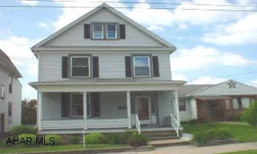 Fabulous 2 1/2 story home in Tyrone School District. Beautiful natural woodwork throughout, new bath, carpet, central air, & furnace. Large yard.