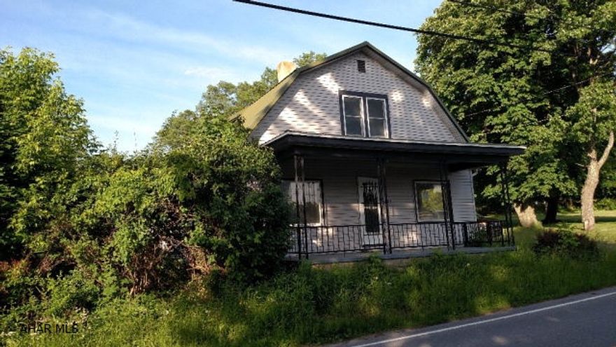 Great curb appeal! This home needs work.  Please use caution when entering - mold and mildew. Heat lines have been cut.