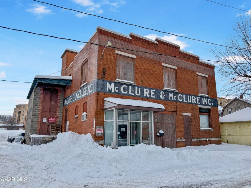 Exceptional opportunity in the Keystone Opportunity Zone (KOZ) in the City of Altoona. This large, all-brick warehouse is zoned Light Industrial & offers incredible flexibility for a wide range of business or investment uses. The property features multiple levels including two expansive floors plus a basement, along with a freight elevator, dedicated office space, & substantial industrial infrastructure throughout. Exterior highlights include ample on-site parking, a loading dock, & an on-site crane, making this property well-suited for logistics, manufacturing, storage, or redevelopment. A rare KOZ property with strong potential. Call today for additional details or to schedule a tour!