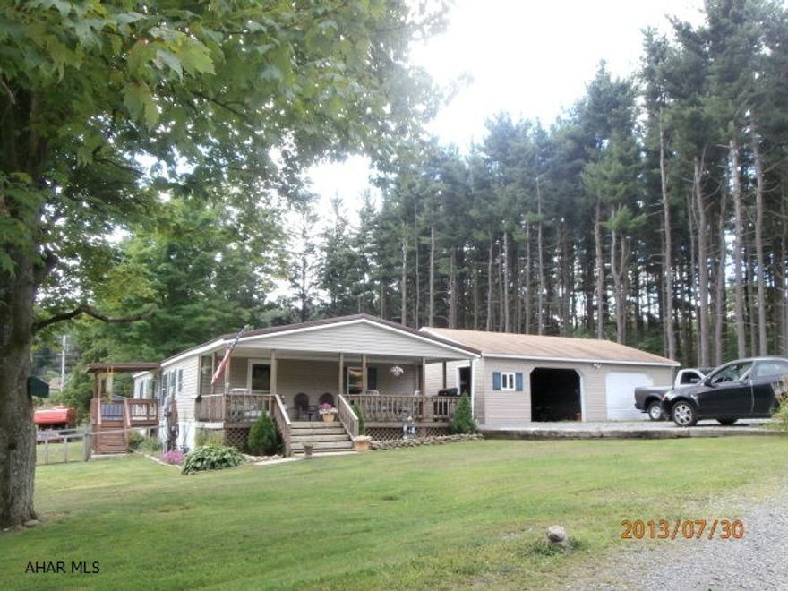 Lot size is approximate - seller having property surveyed and subdivided. Very clean and well maintained home with oversized 2 car garage. Nice country setting.